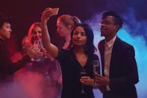 pose-virtual-photo-booth_0001_african-american-couple-taking-selfie-in-nightclub-2023-11-27-05-06-23-utc